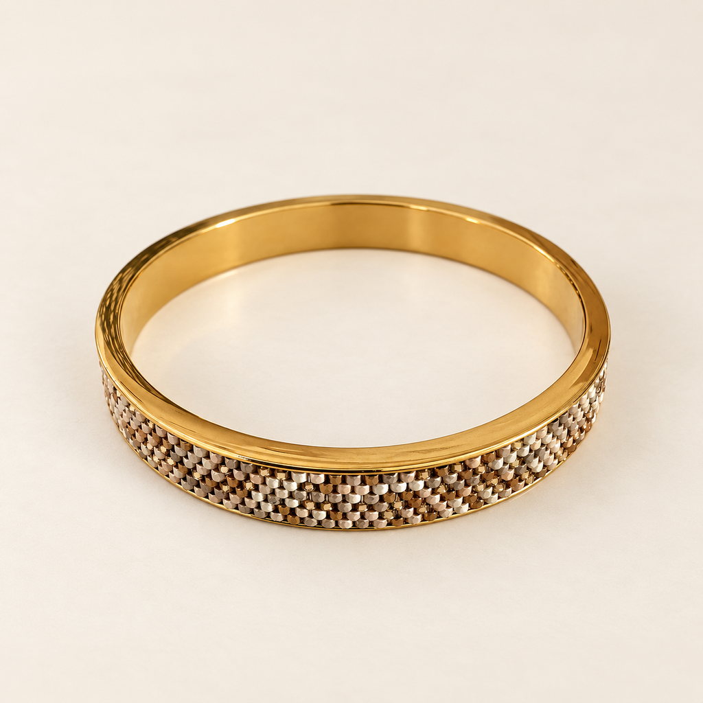 Gold-toned bangle with intricate white, champagne and warm metallic beadwork
